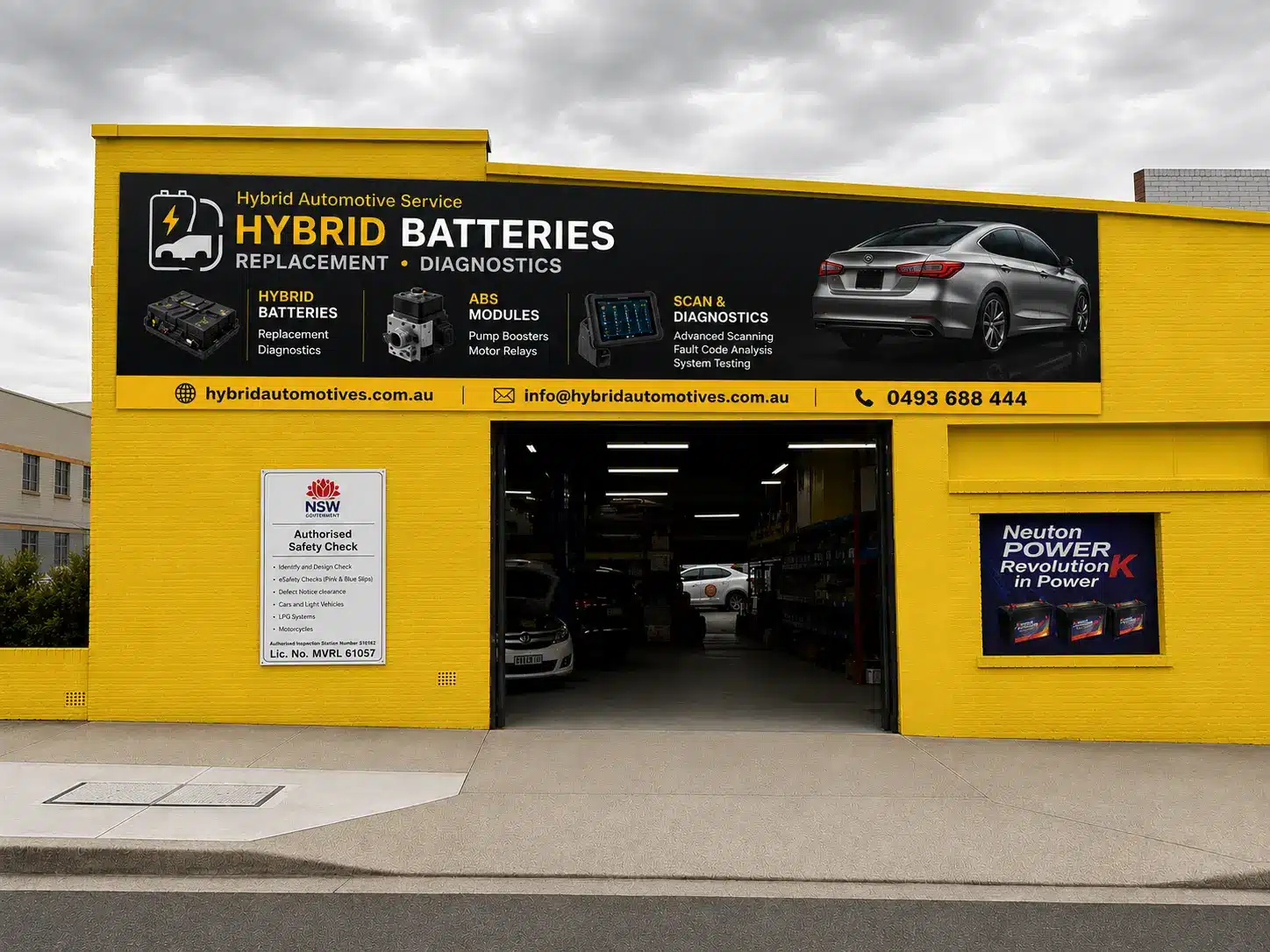 Hybrid Automotive Service Belmore workshop technician working on a hybrid vehicle